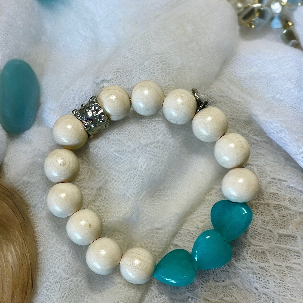 
                      
                        Armband Bali-3, weisse Holzperlen m Herzen, TwentyViolets
                      
                    