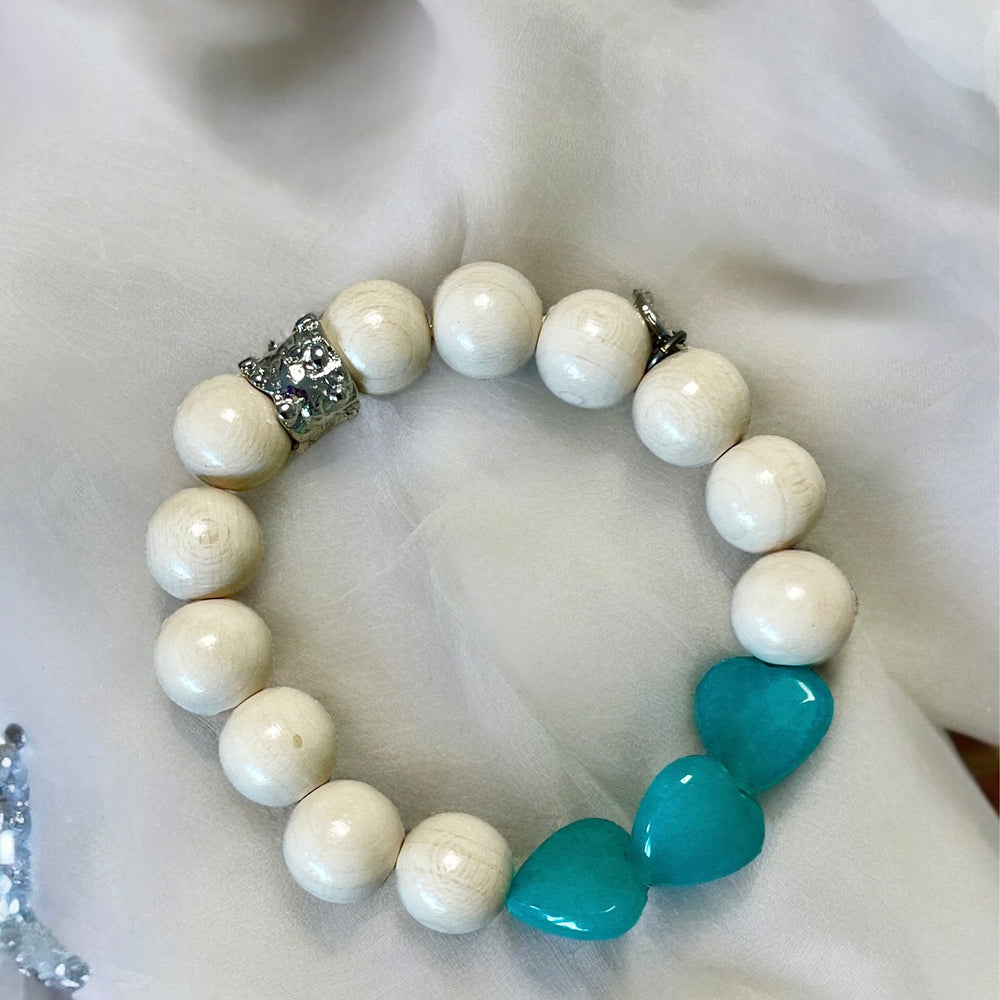 
                      
                        Armband Bali-3, weisse Holzperlen m Herzen, TwentyViolets
                      
                    