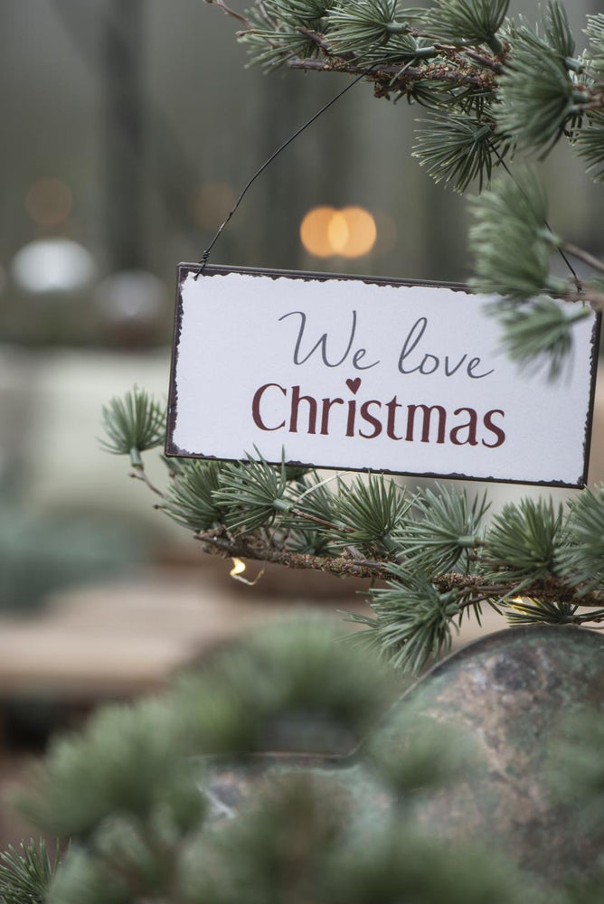 
                      
                        Schild "We love Christmas", Ib Laursen
                      
                    